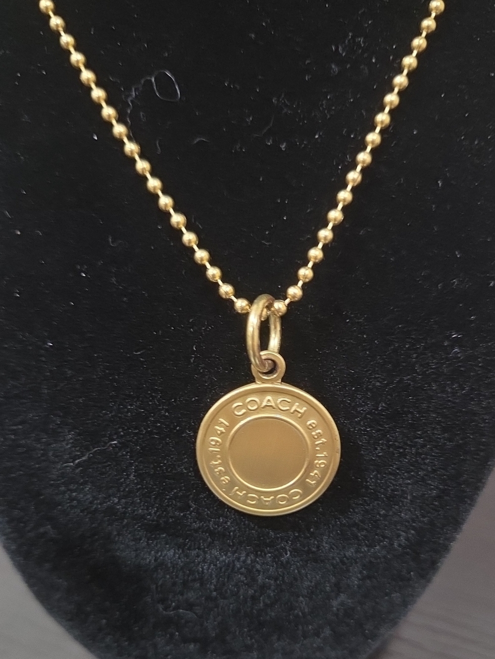 COACH Gold Disc Pendant Necklace - Signature Circle Charm